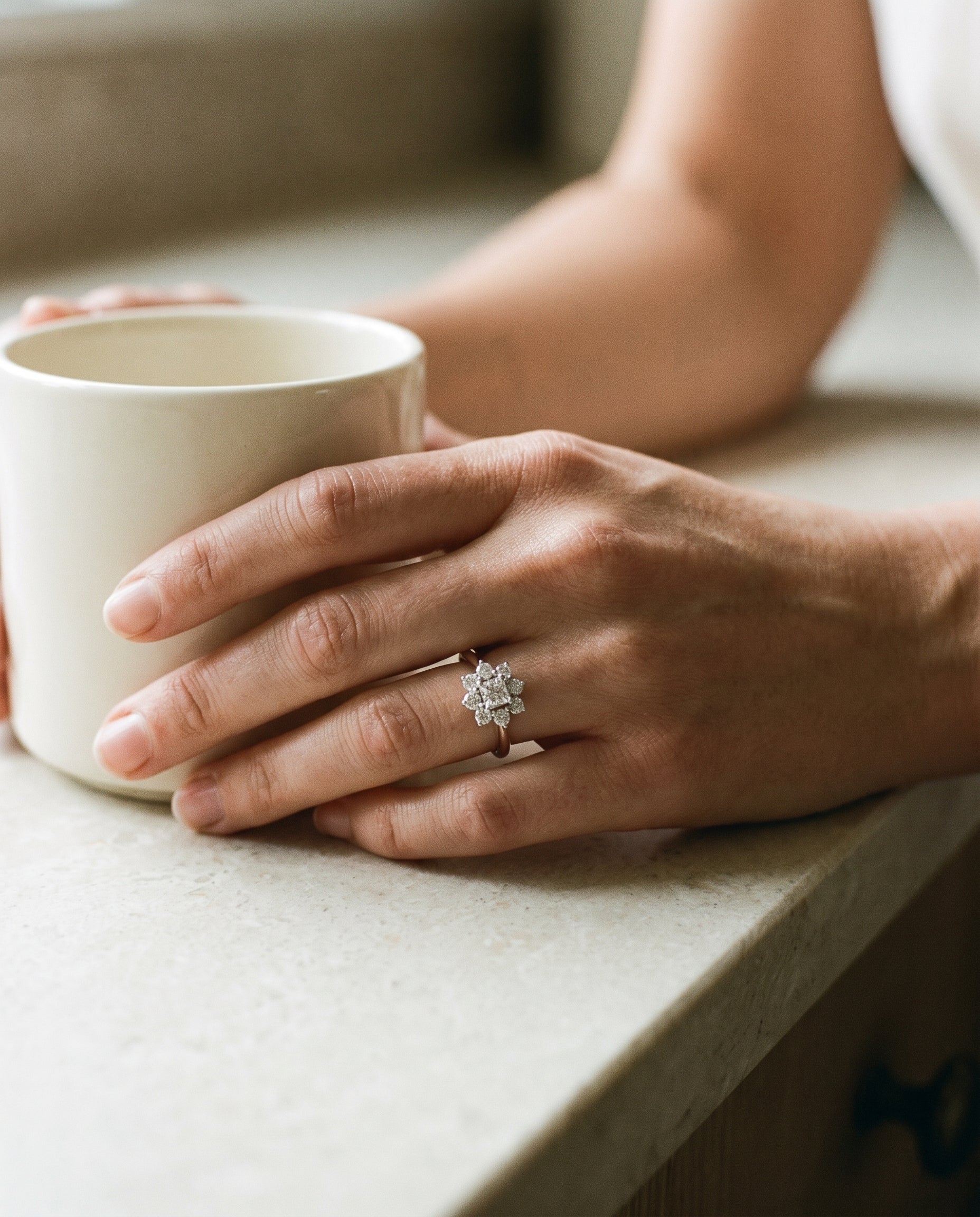 Tiffany & Co. .950 Platinum Diamond Flower Ring — shown worn, second view