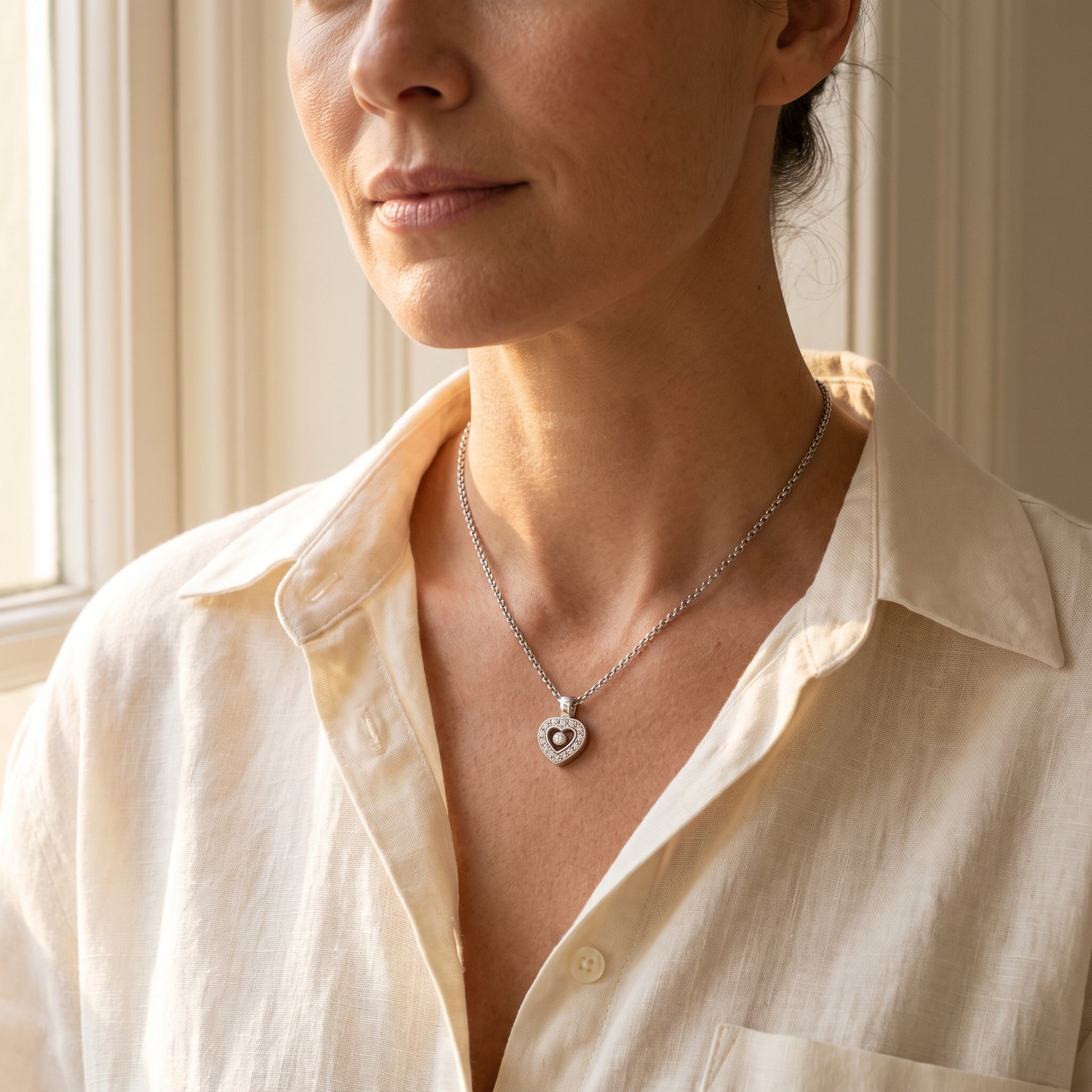 Chopard "Happy Diamond" Heart Pendant — shown worn