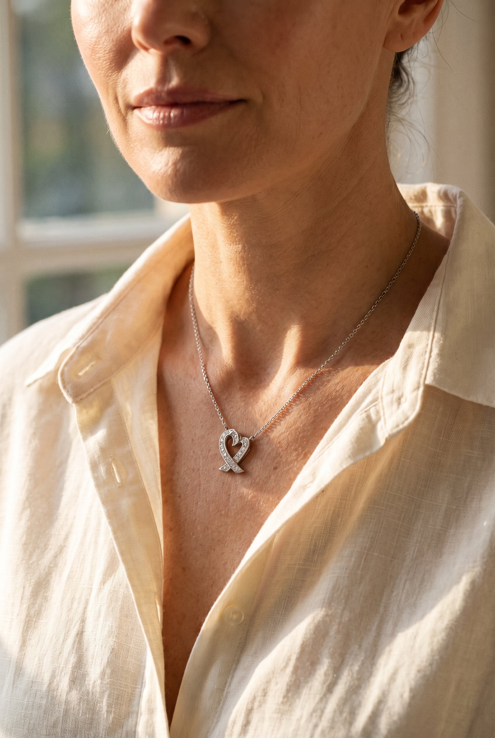 Tiffany & Co. Platinum Paloma Picasso Diamond Loving Hearts — shown worn