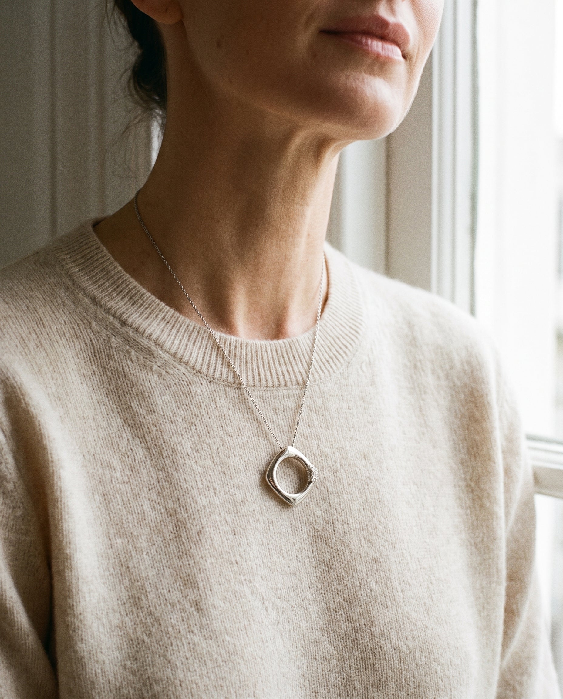 Tiffany & Co. "Italy" Diamond Pendant — shown worn, second view