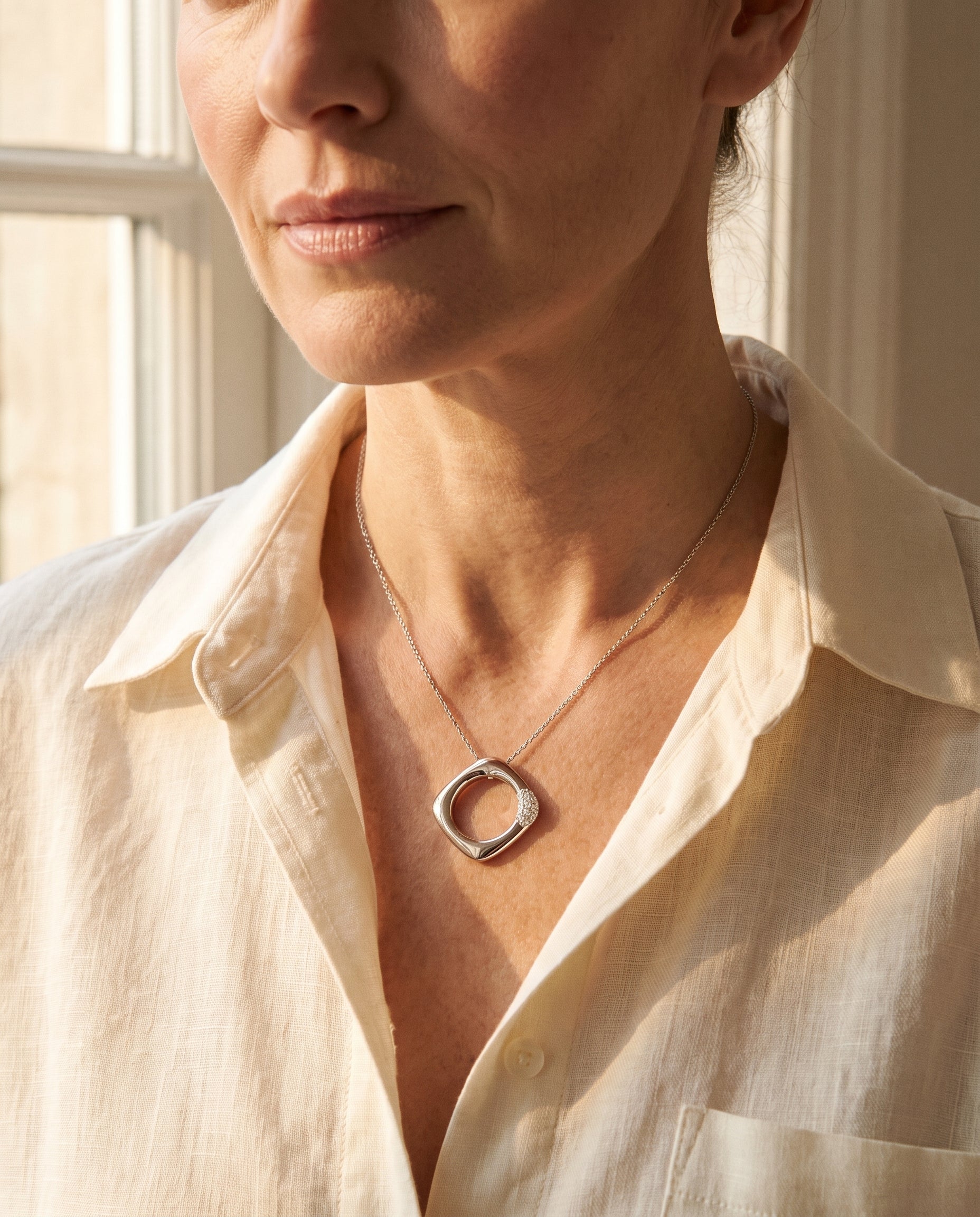 Tiffany & Co. "Italy" Diamond Pendant — shown worn