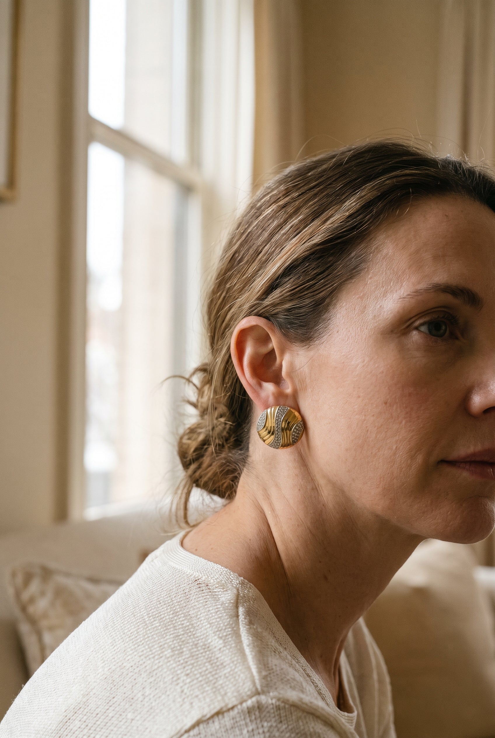Tiffany & Co. Gold and Diamond Ear Clips — shown worn, second view
