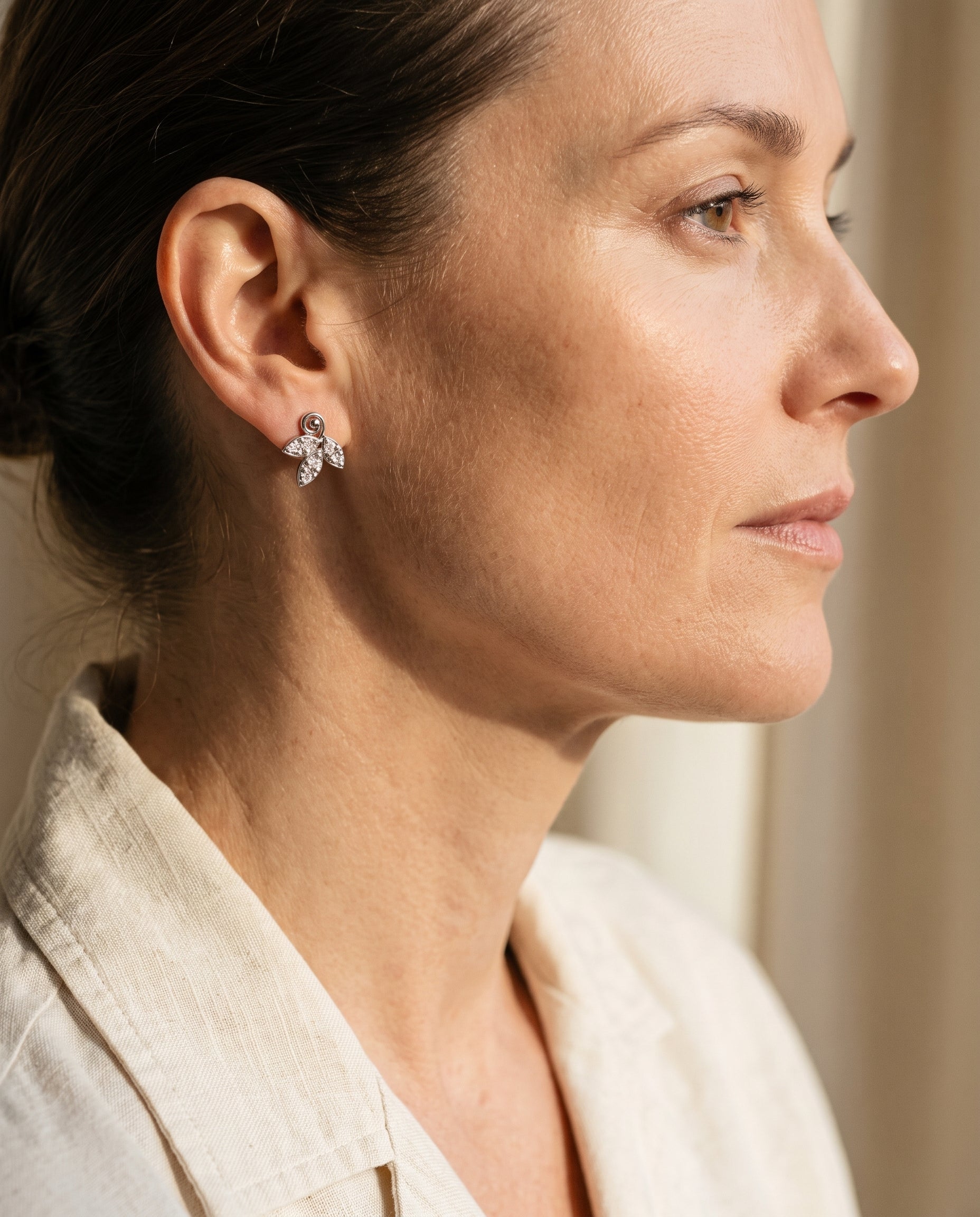 Tiffany & Co. 18k White Gold Diamond Leaf Earrings — shown worn
