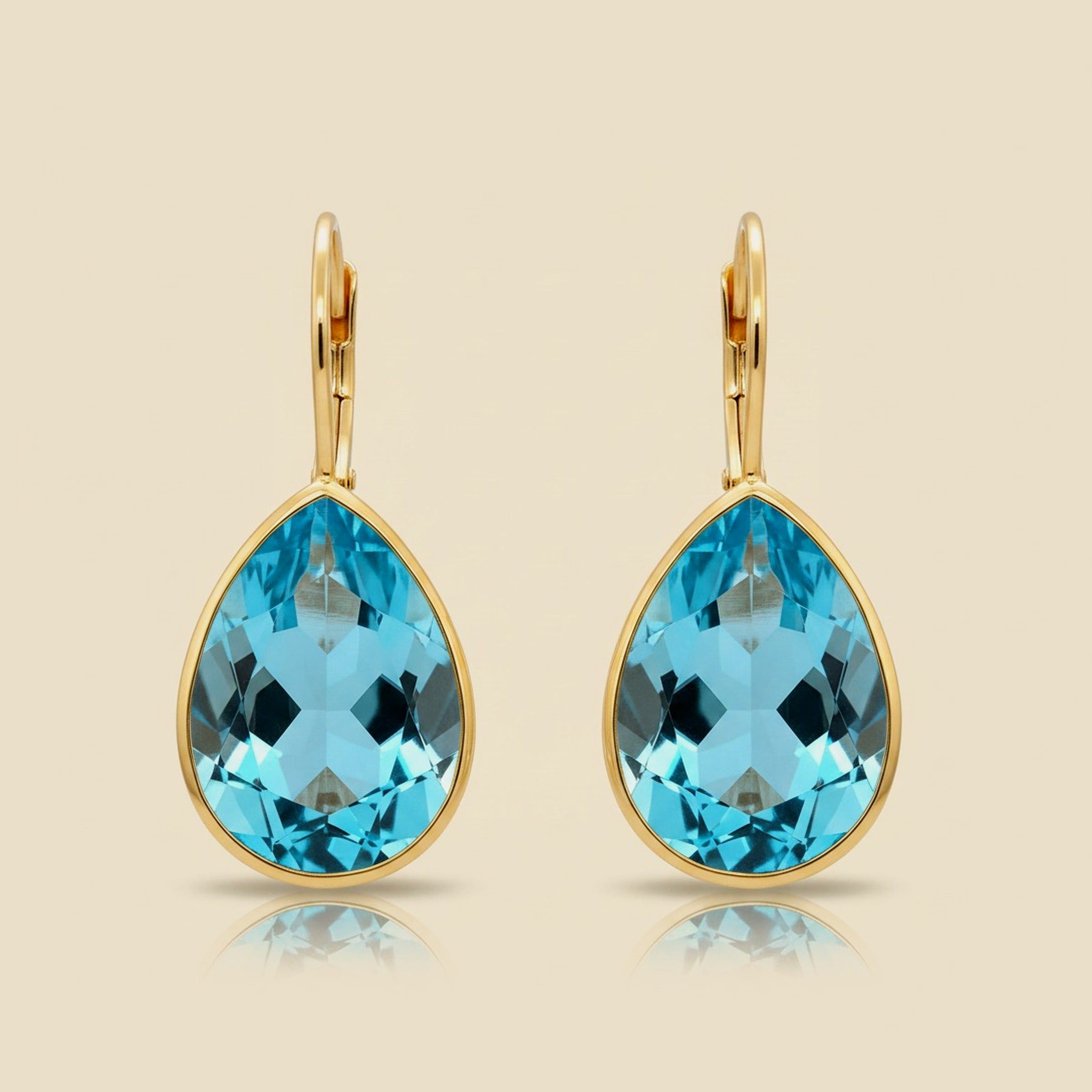 14k Yellow Gold Blue Topaz Earrings