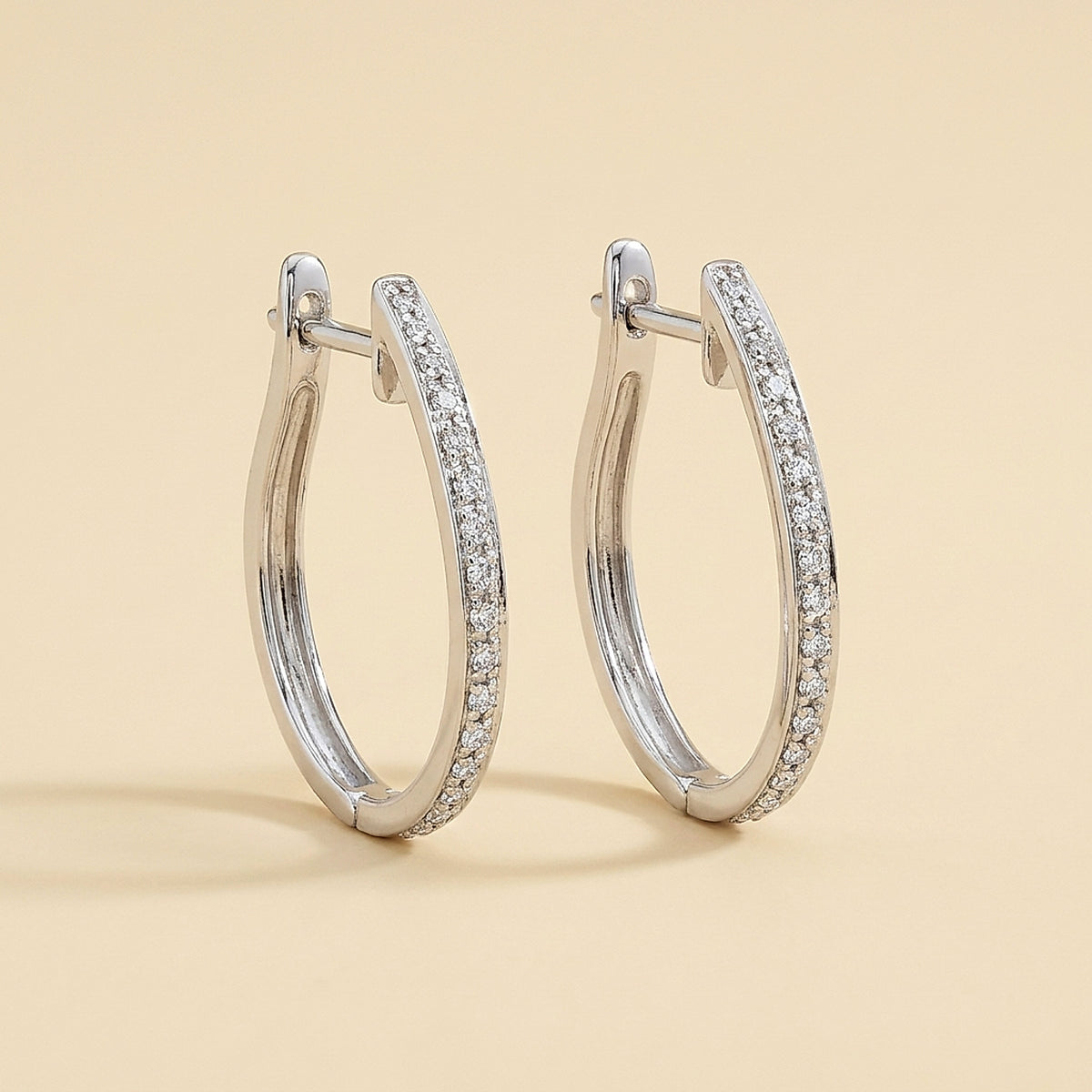Oval White Gold Diamond Hoops