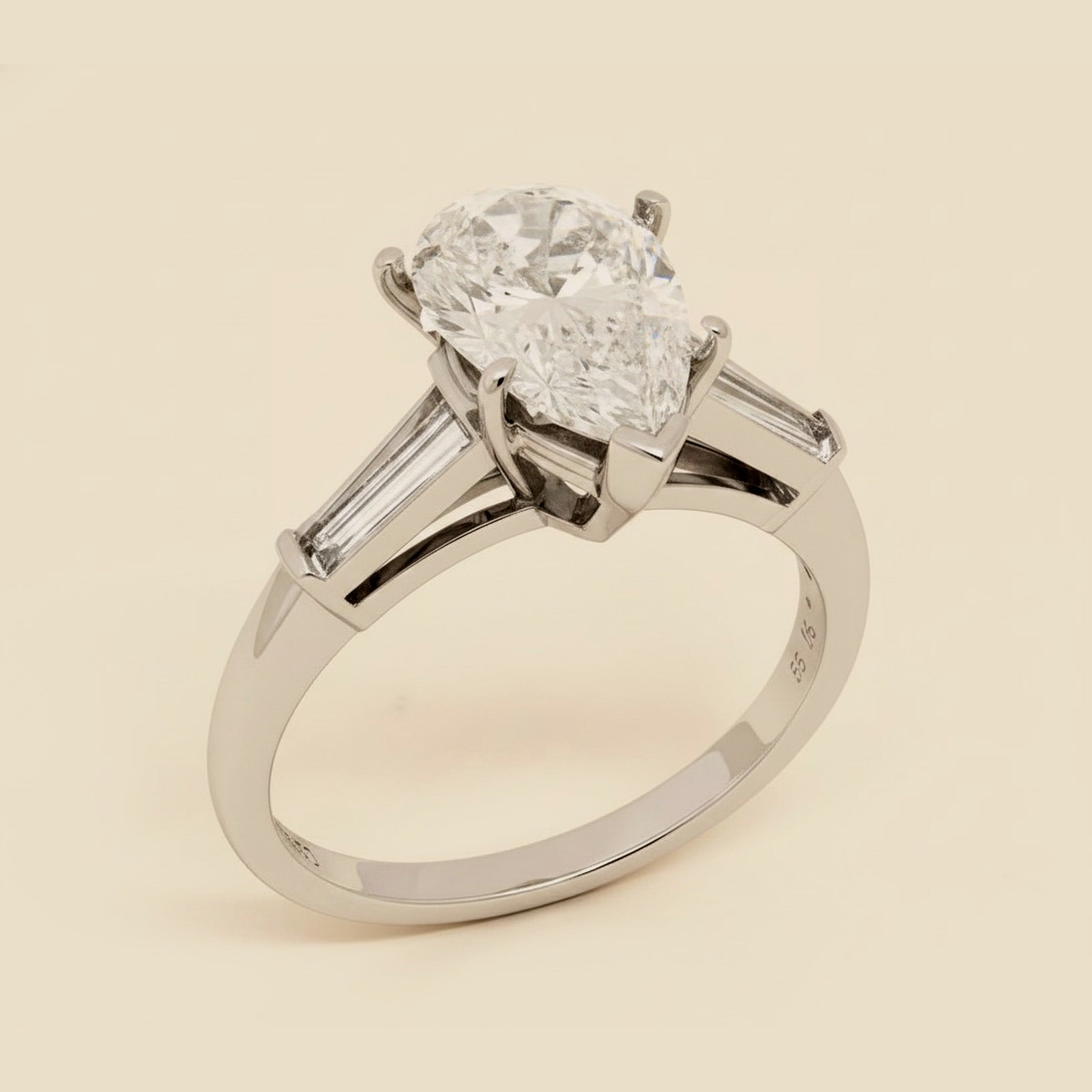 Tradional Platinum Pear Shaped Diamond Engagement Ring 1.36cts.