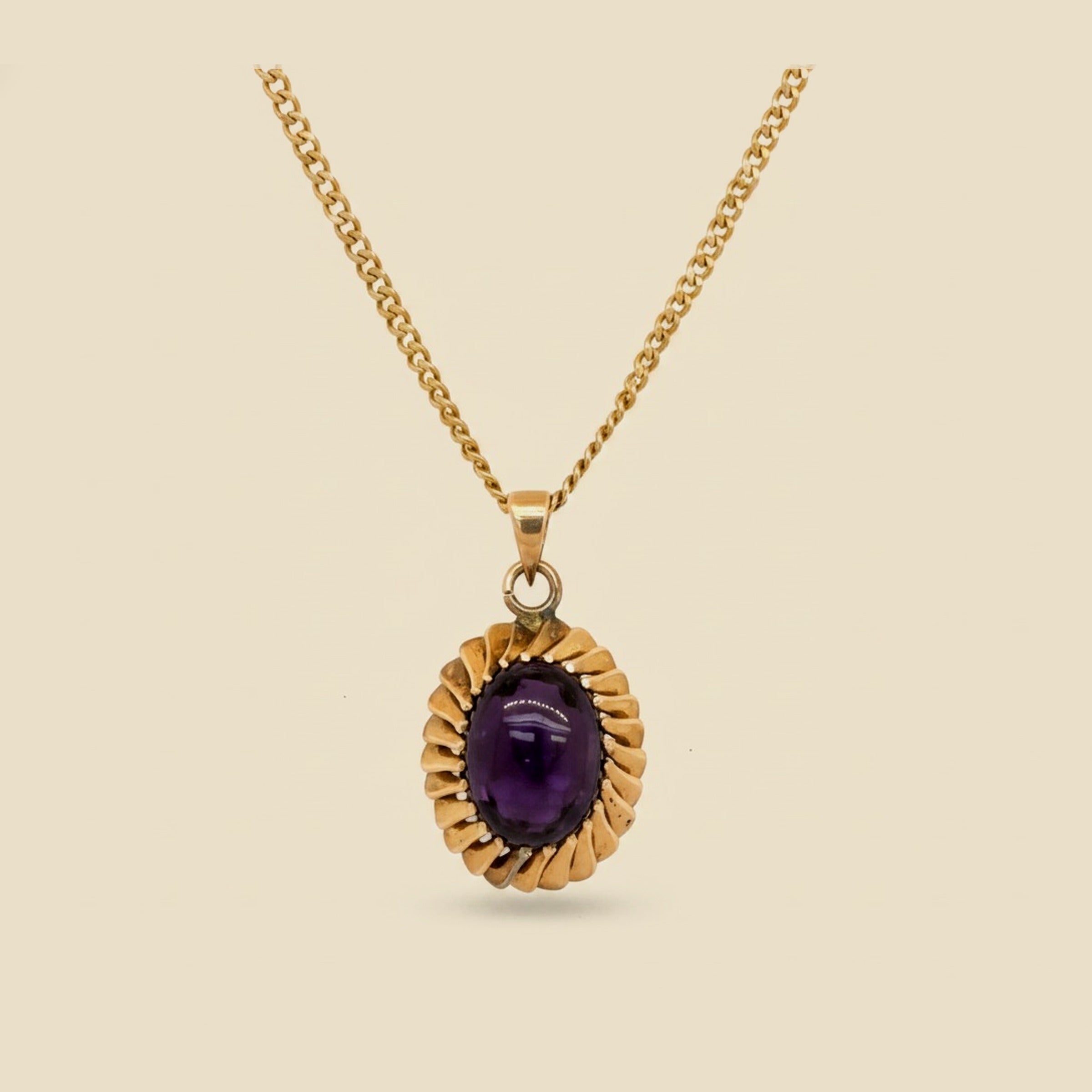 Yellow Gold Cabochon Amethyst Pendant