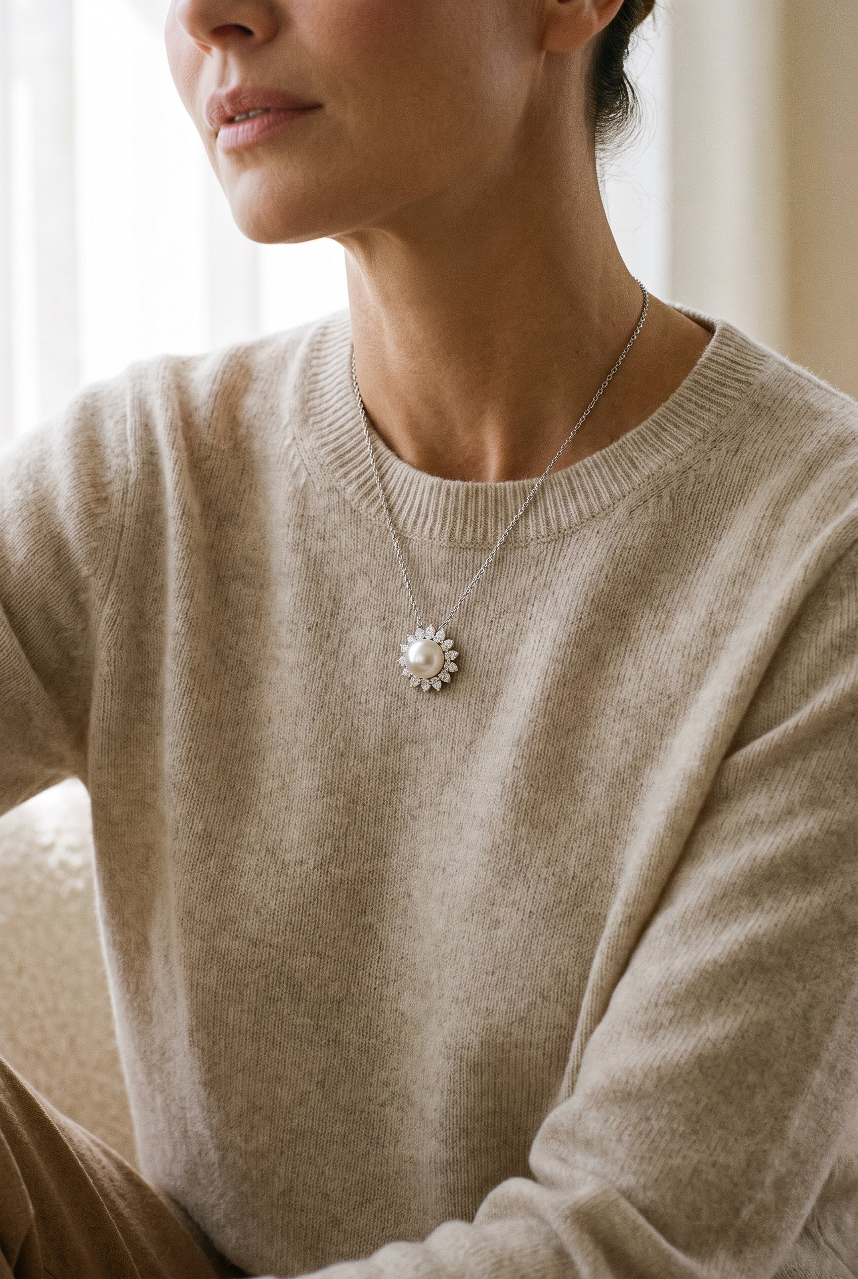 Tiffany & Co. Platinum Diamond and Pearl Pendant — shown worn, second view