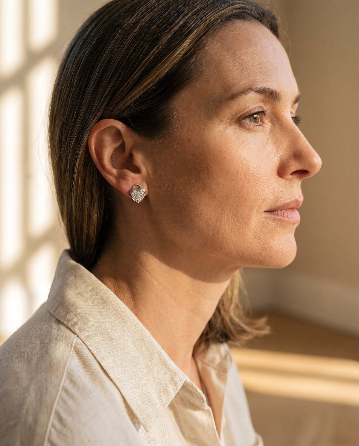 Damiani White Gold 18k Diamond Heart Earrings — shown worn