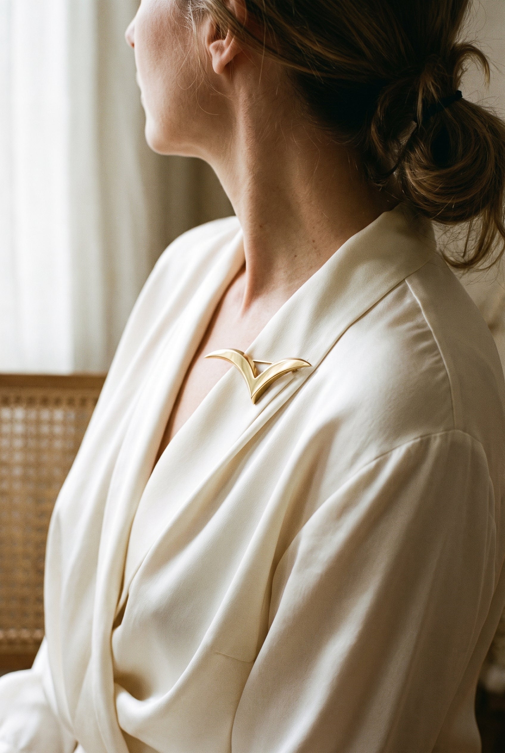 Tiffany & Co. 18K Seagull Pin/Brooch — shown worn, second view
