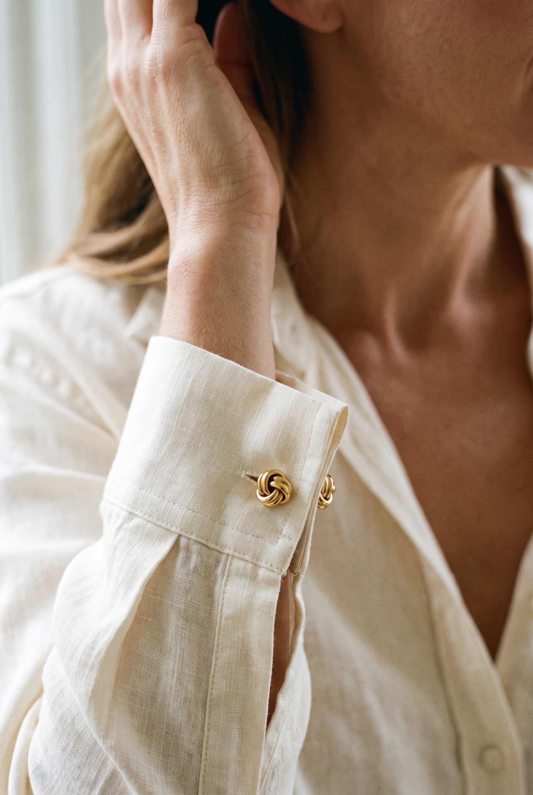 Tiffany & Co. 18k Yellow Gold Knot Cufflinks — shown worn, second view