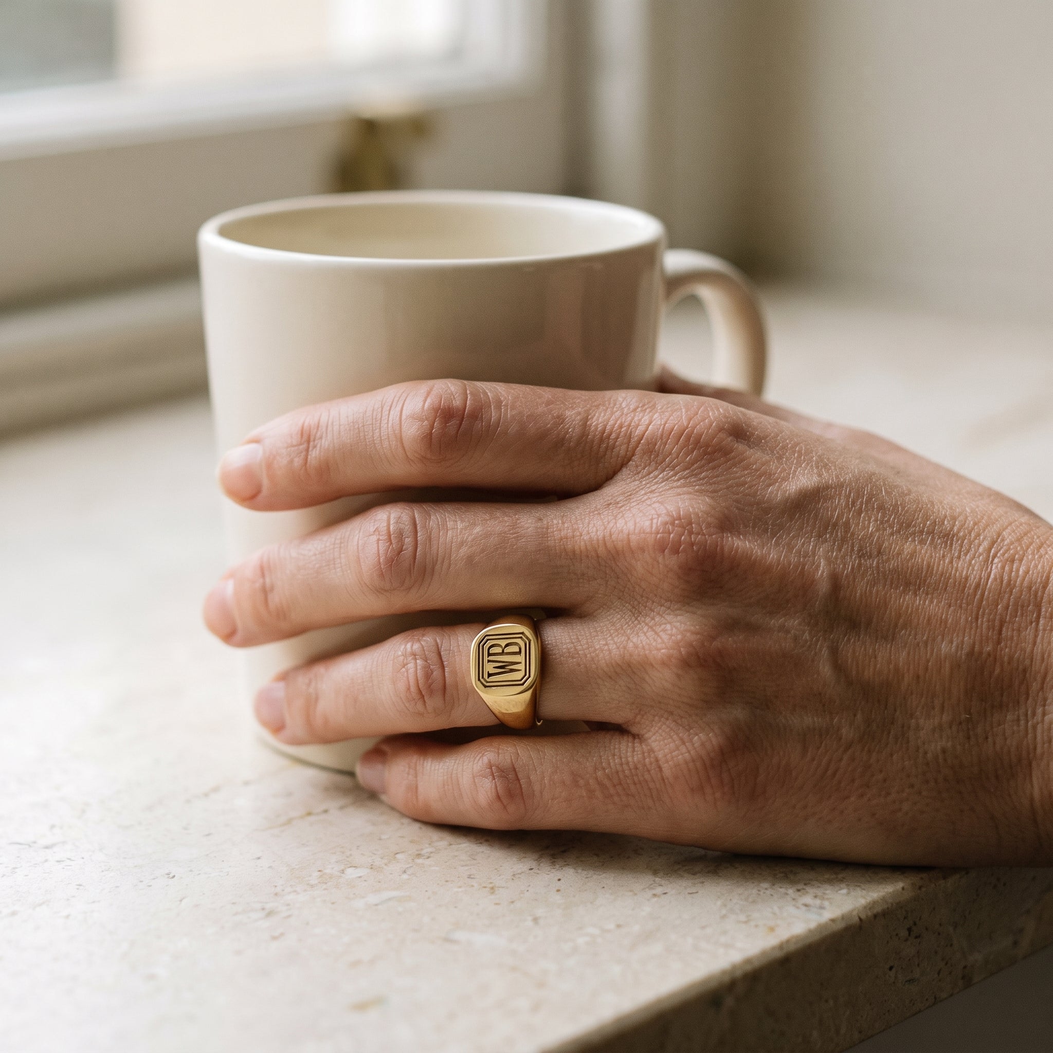 Tiffany & Co. 14k Yellow Gold Initial Ring — shown worn, second view