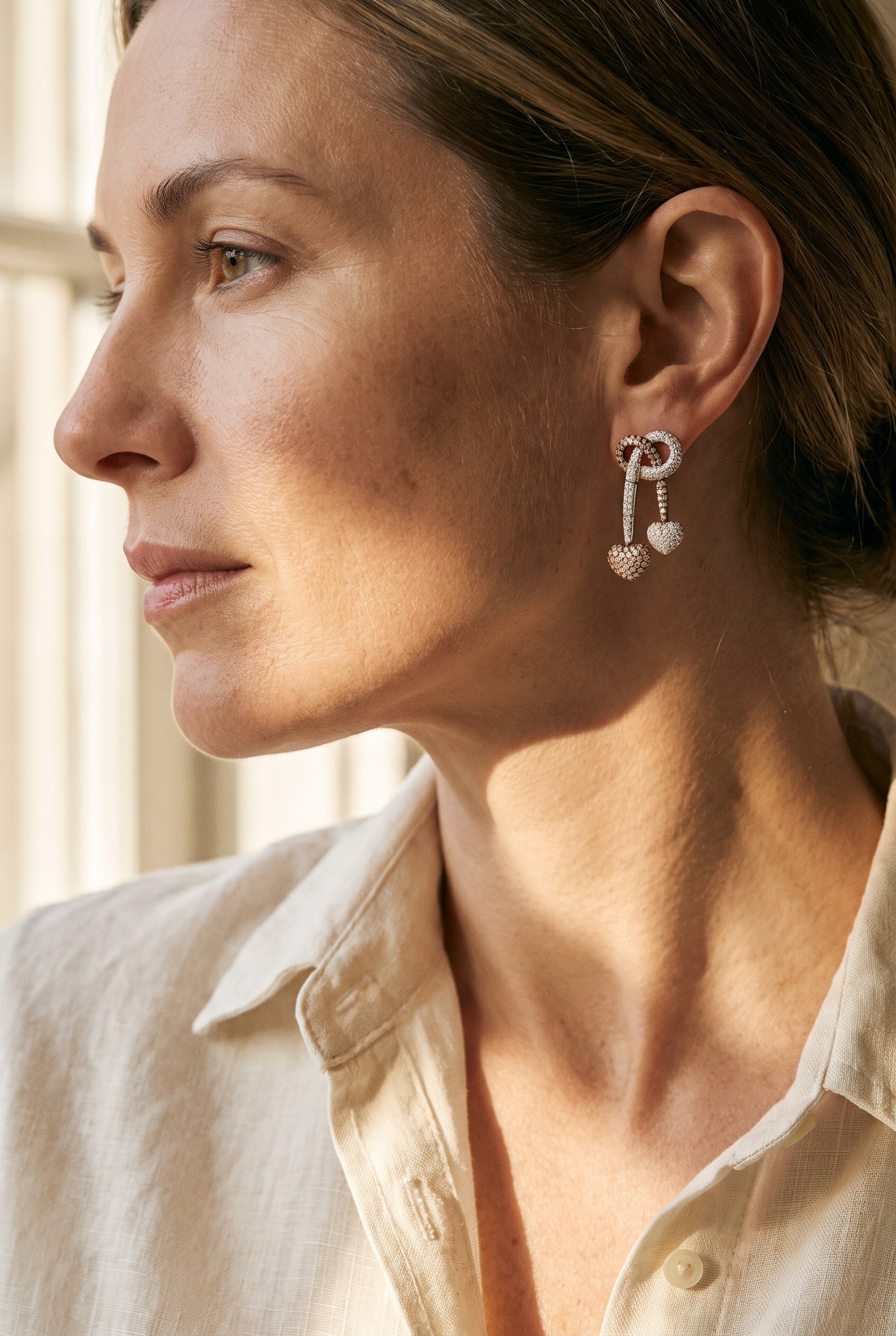 Two Tone Diamond Tassel Heart Earrings — shown worn