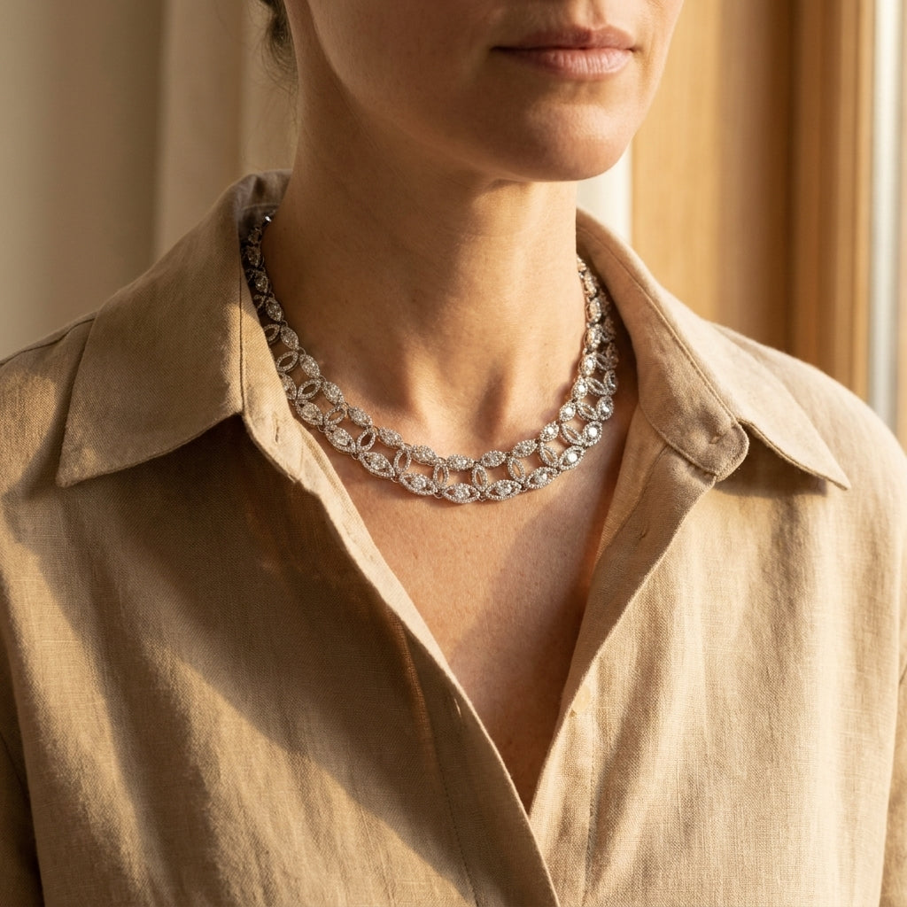 Garavelli white gold marquise link diamond choker worn at an open linen collar, editorial lifestyle photo