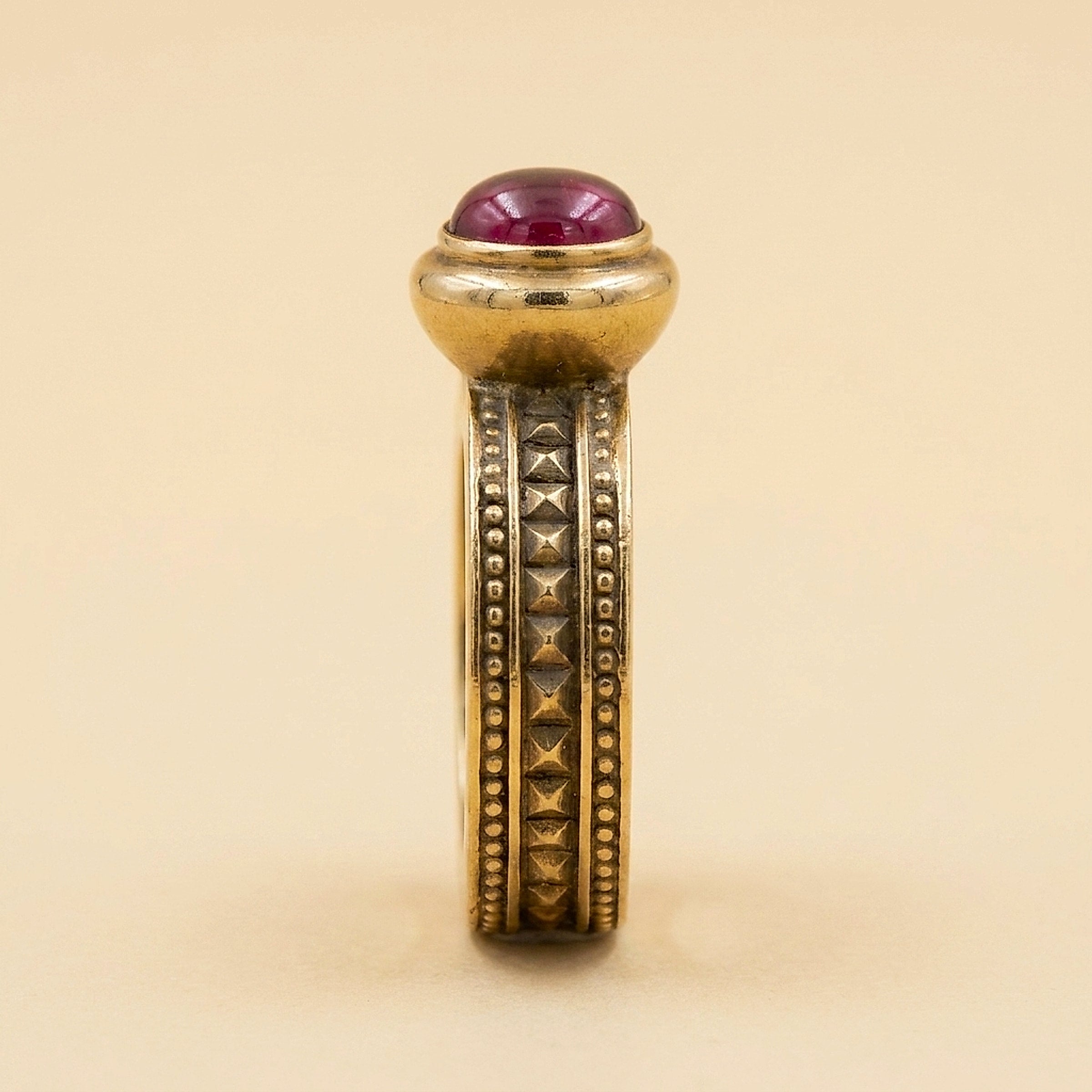 Yellow Gold Byzantine Ring with a Garnet