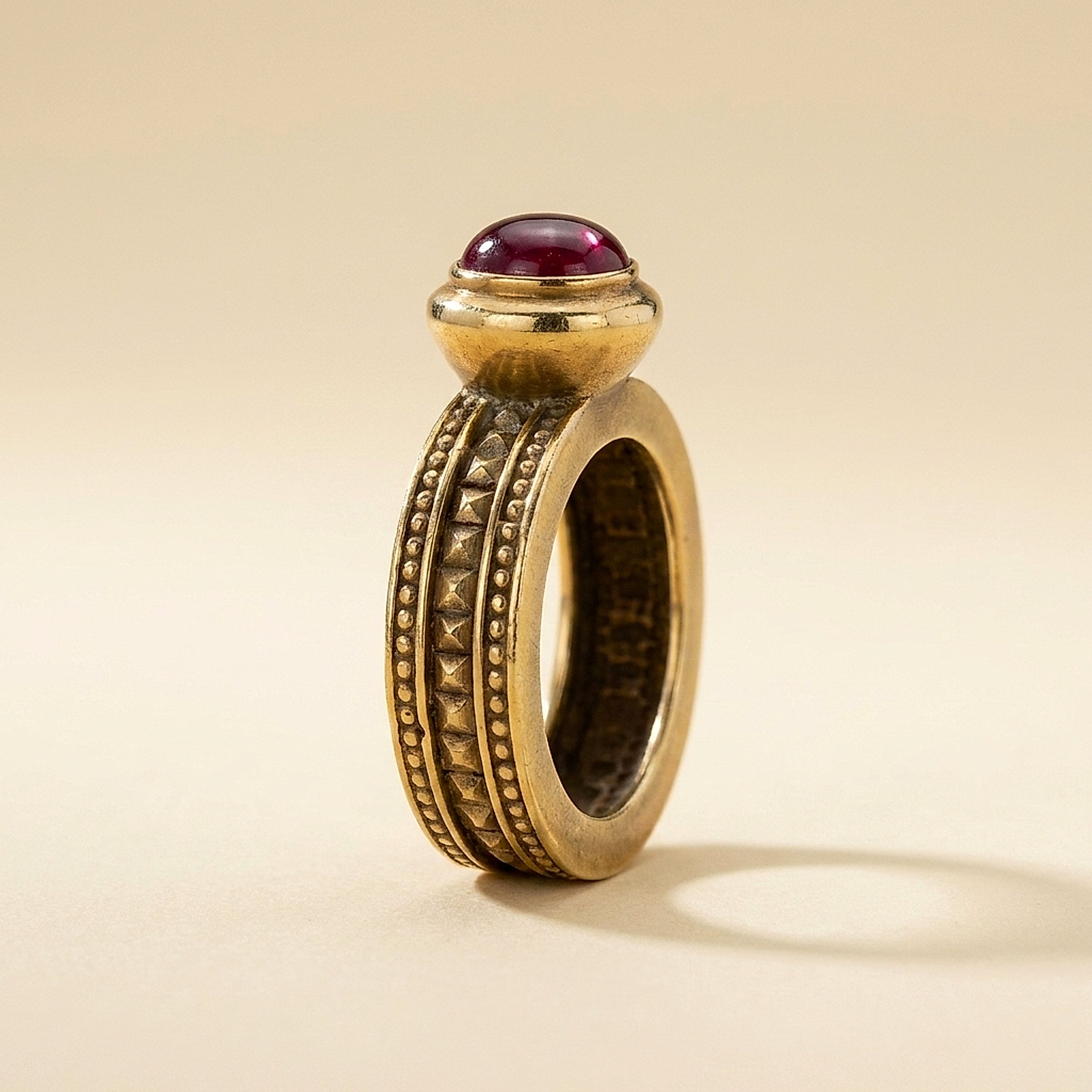 Yellow Gold Byzantine Ring with a Garnet