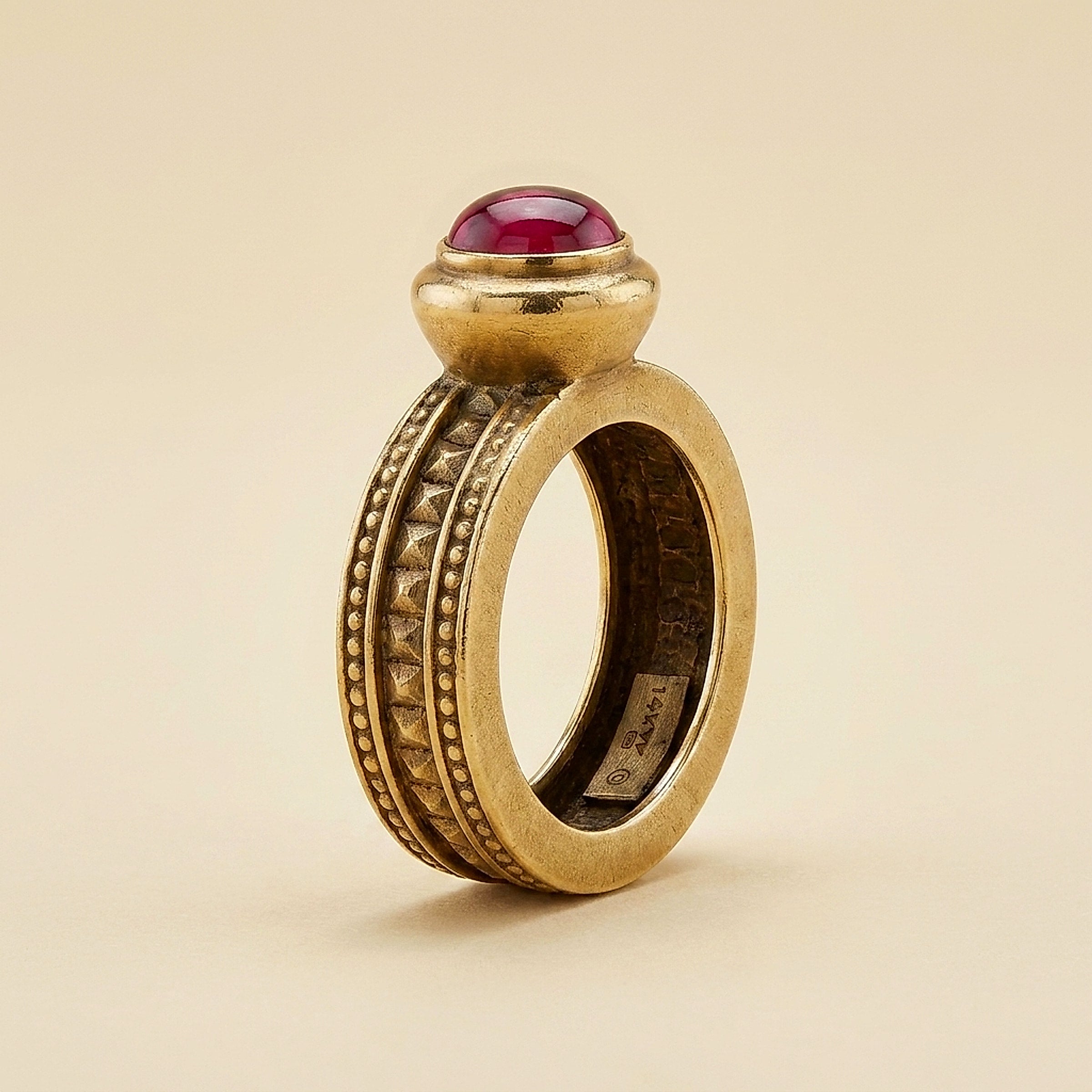Yellow Gold Byzantine Ring with a Garnet