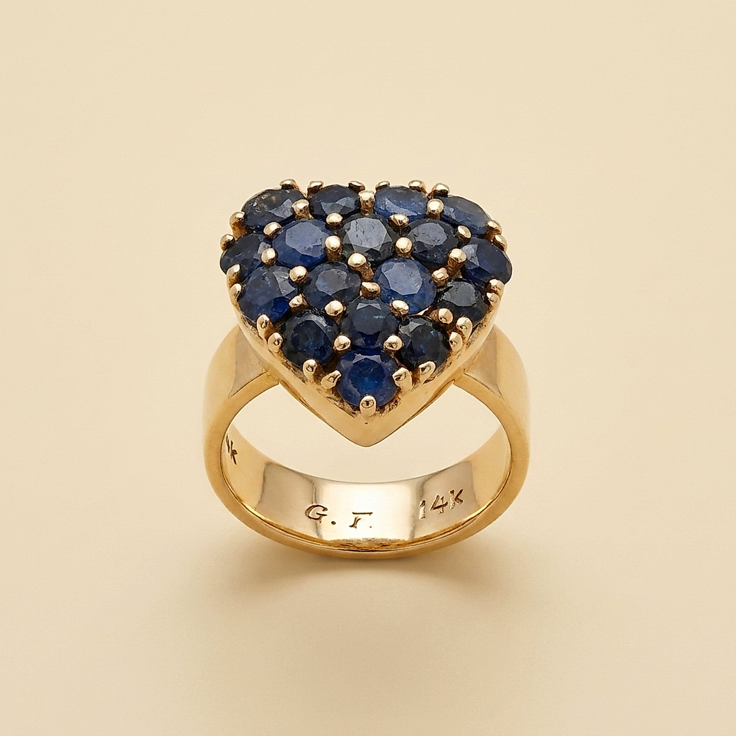 Yellow Gold Heart filled with round Sapphires