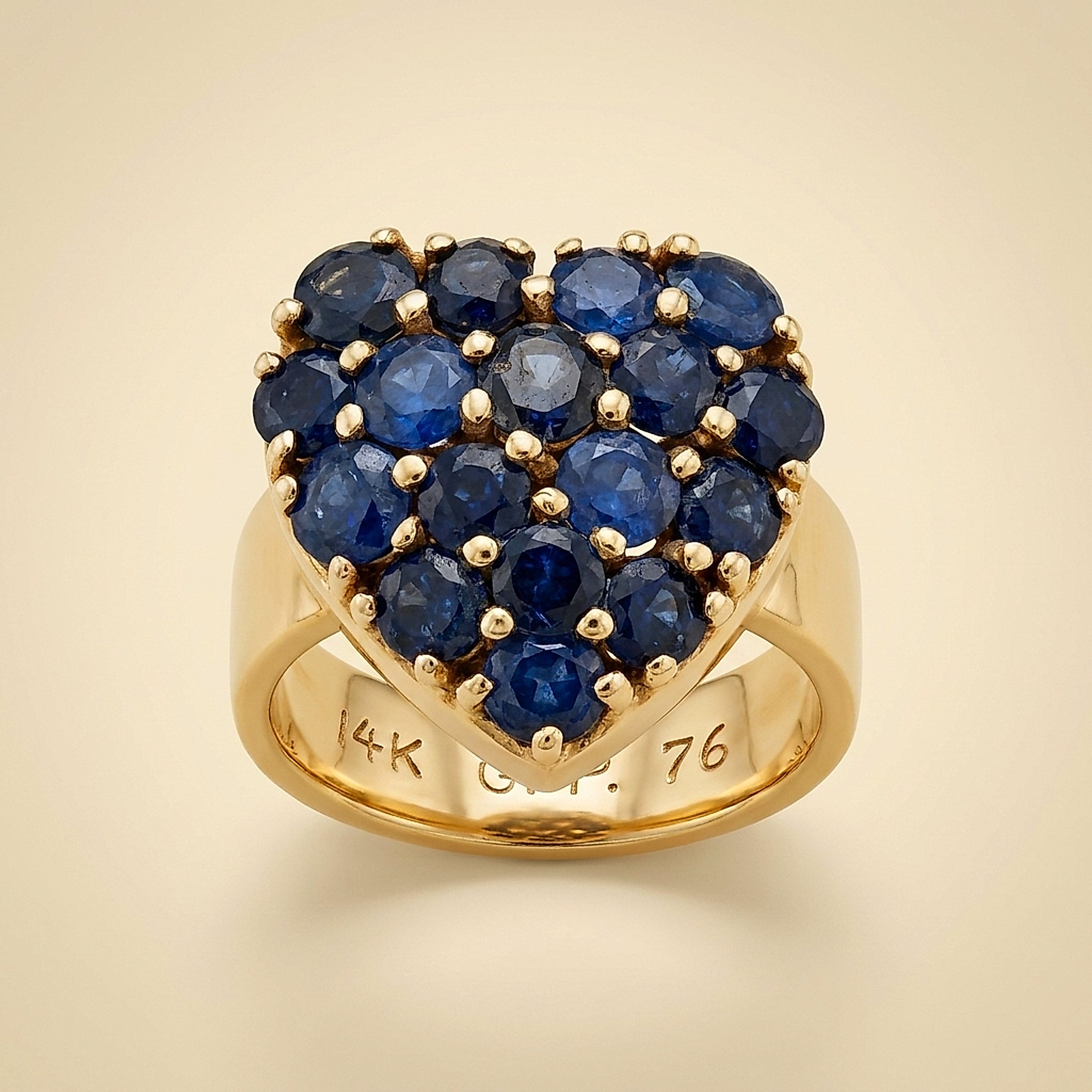 Yellow Gold Heart filled with round Sapphires