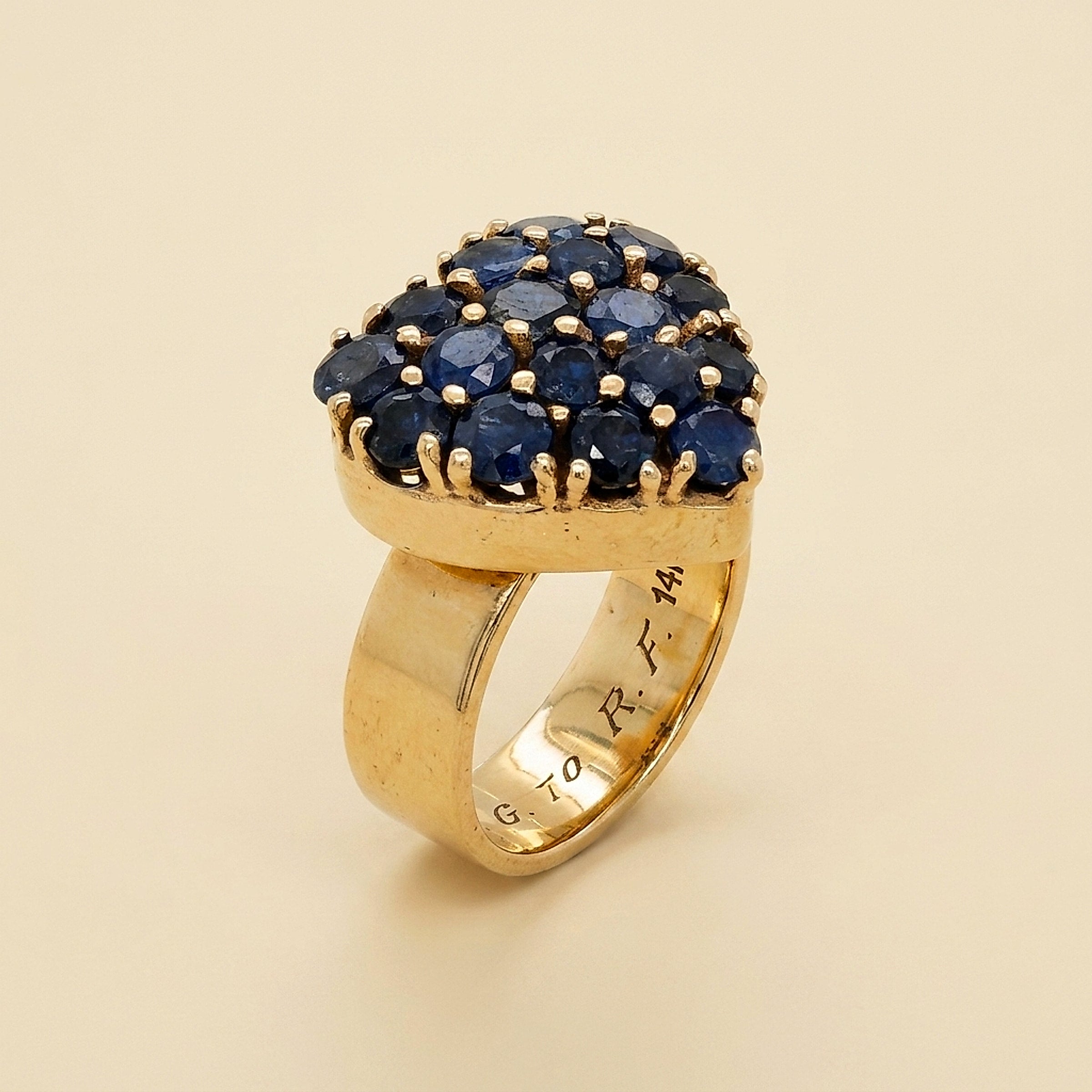 Yellow Gold Heart filled with round Sapphires