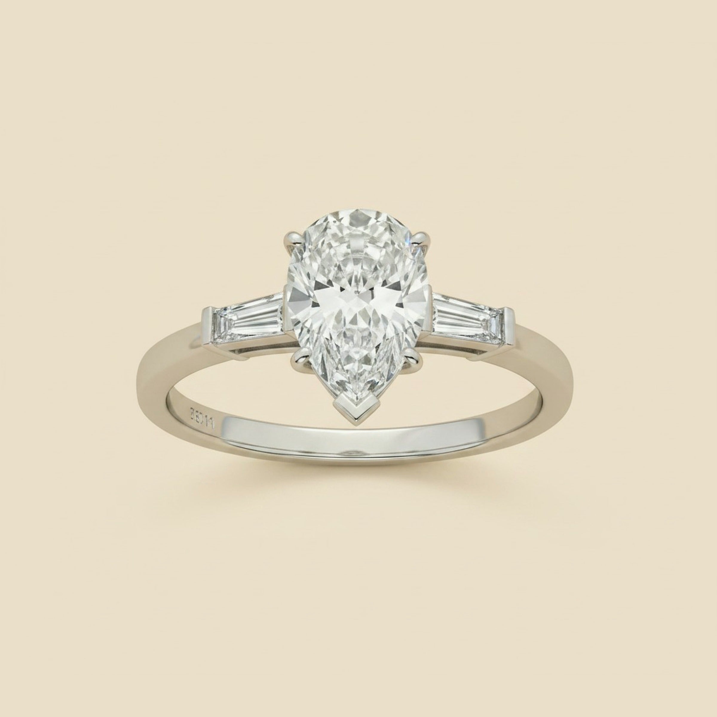 Tradional Platinum Pear Shaped Diamond Engagement Ring 1.36cts.