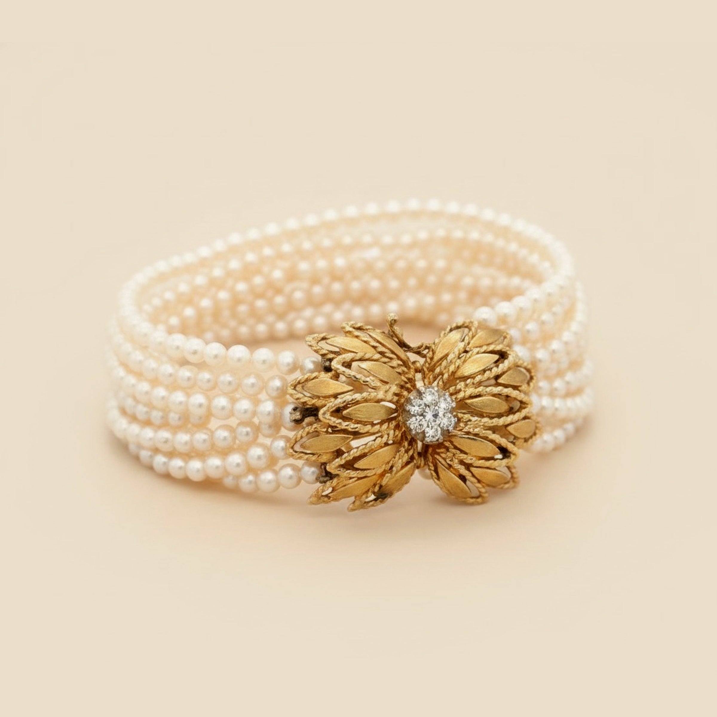 Twisted Multi-Row Pearl Bracelet with a Yellow Gold Clasp