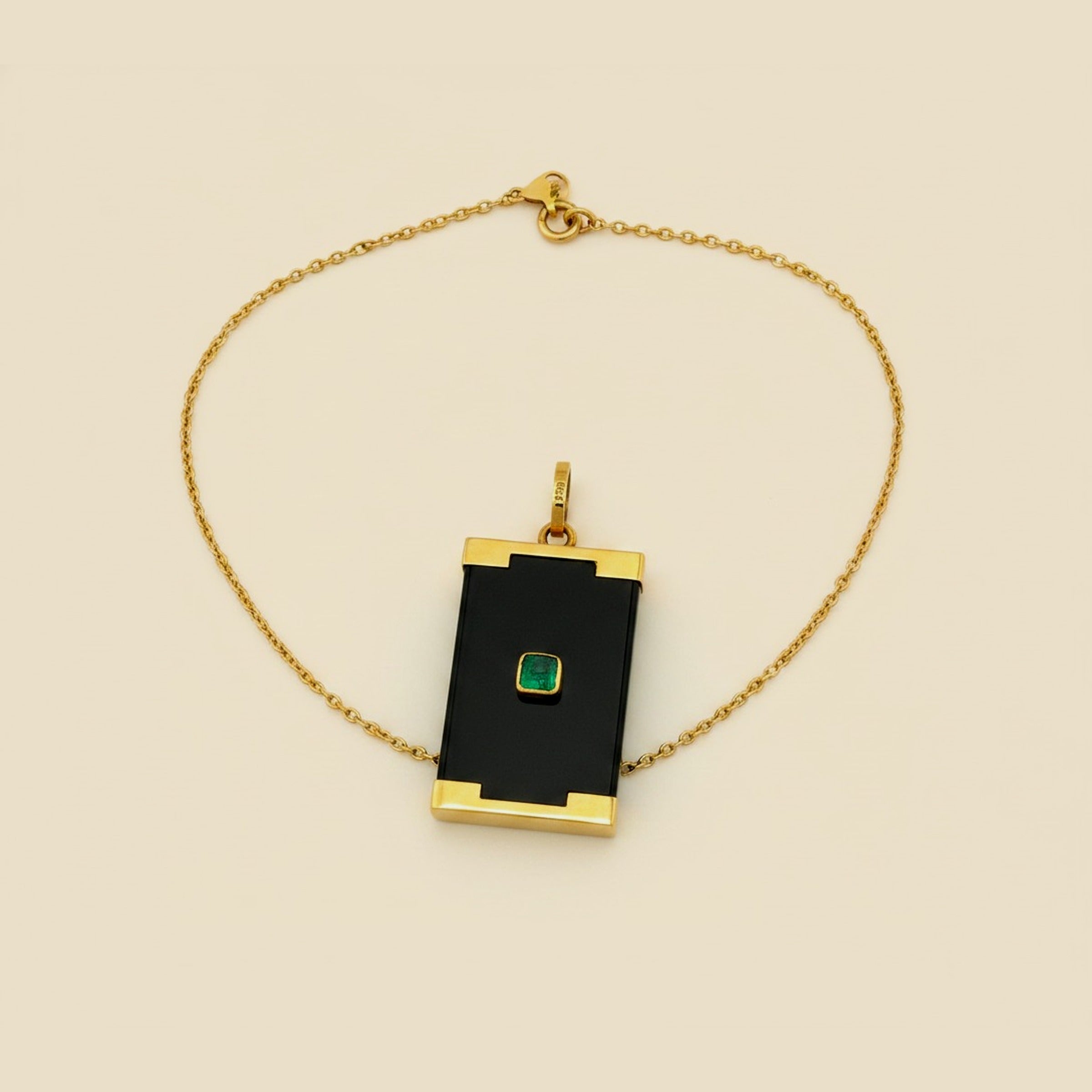 Black Onyx Pendant set in Yellow Gold