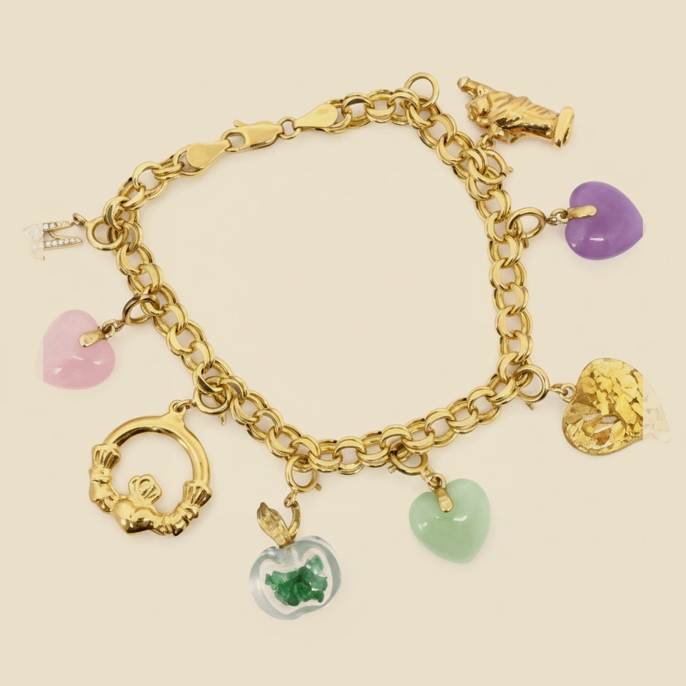 Charm Bracelet with 9 Assorted Charms – Empire Diamond