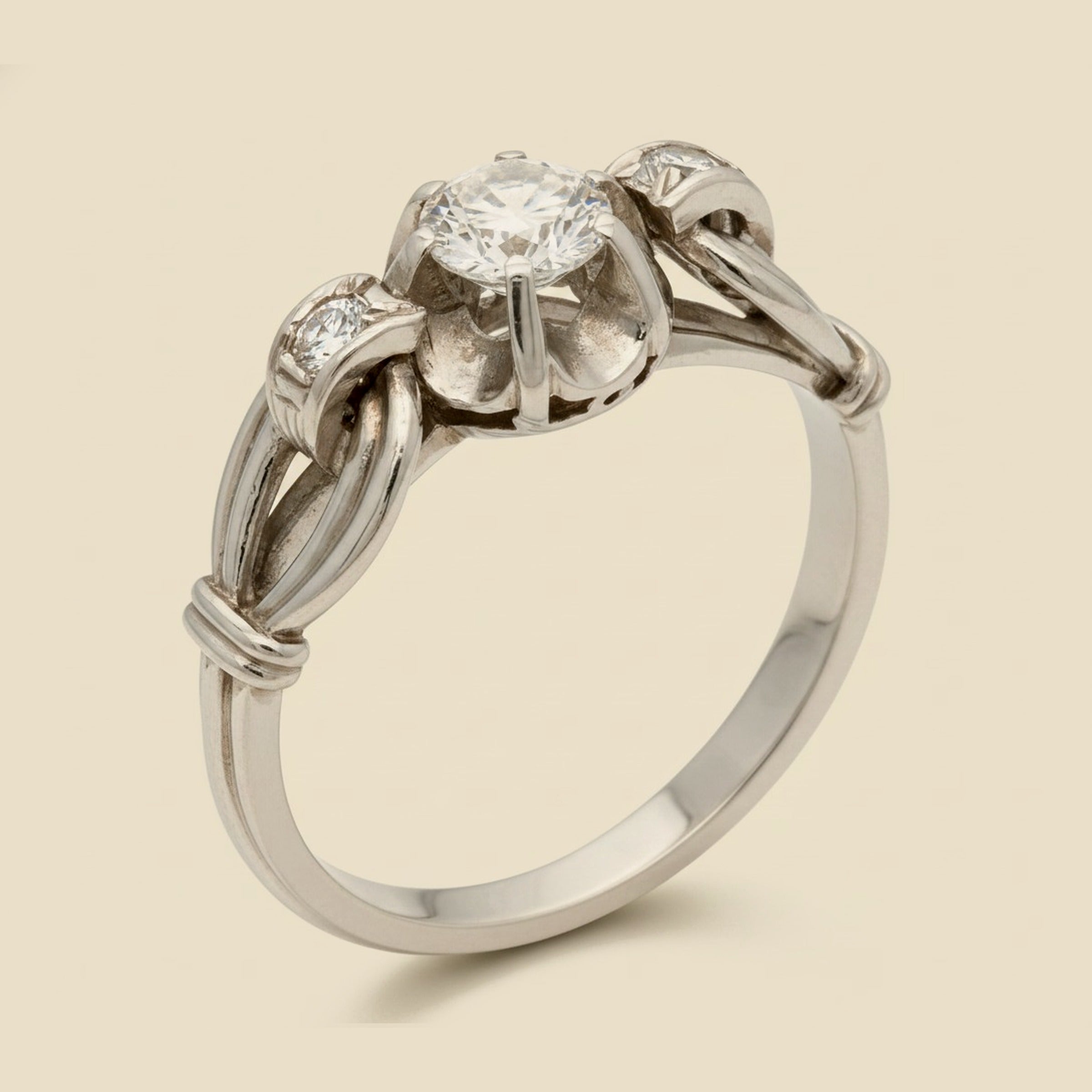 Platinum Art Deco 3-Stone Love Knot Ring – Empire Diamond