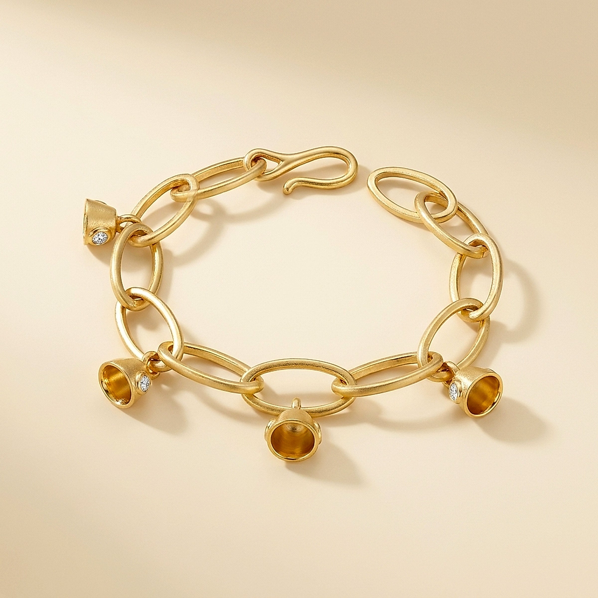 18K Yellow Gold Matte Oval Link Bell Charm Bracelet
